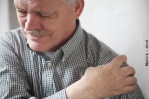 man with painful shoulder joint